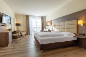 Postel nebo postele na pokoji v ubytování Hotel Ohlenhoff