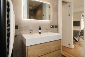 TV a/nebo společenská místnost v ubytování Steenhof Beach House + 23 fotografií