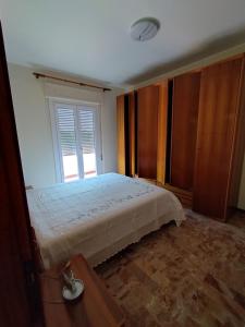 Postel nebo postele na pokoji v ubytování Appartamento SoleeMare