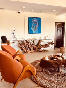 Ruang duduk di Triplex frente mar, com rooftop, piscina e jacuzzi! +97 gambar