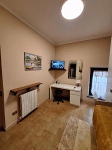 TV o dispositivi per l'intrattenimento presso Casa Luciana - Comfort a Lucca con Parcheggio