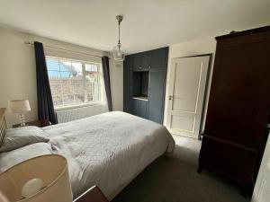 Voodi või voodid majutusasutuse Kerry Hideaway toas