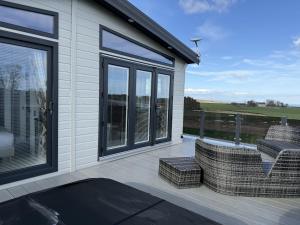Balkón nebo terasa v ubytování Lodge 86 Stewarts Resort, St Andrews