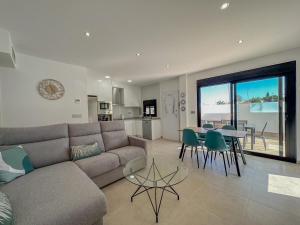 a living room with a couch and a table at Villamar 6 in San Pedro del Pinatar