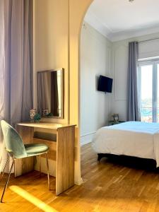 TV a/nebo společenská místnost v ubytování Hotel La Citadelle + 42 fotografií
