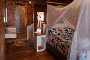 Koupelna v ubytování Hotel Calamari Baru