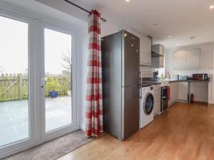 Η κουζίνα ή μικρή κουζίνα στο Lowenek +18 φωτογραφίες