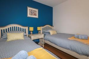 Ένα ή περισσότερα κρεβάτια σε δωμάτιο στο Lowenek