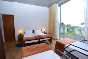 Letto o letti in una camera di Tara Waterfall