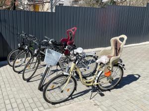 a group of bikes parked next to each other at Málnahome Wellness Apartman in Szob