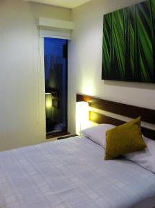 Postel nebo postele na pokoji v ubytování Isla Verde Hotel
