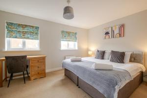 Billede fra billedgalleriet på Comfy & stylish 4 bed house i Bedford