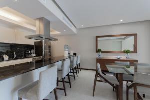 Kuchyň nebo kuchyňský kout v ubytování Bolongo Spectacular Punta Mita Beachfront