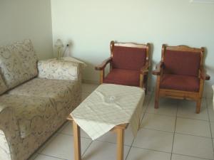 A seating area at Sagittarius Apartments