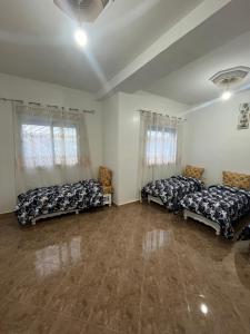 Ένα ή περισσότερα κρεβάτια σε δωμάτιο στο Location appartement meublé