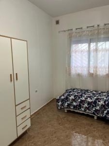 Ένα ή περισσότερα κρεβάτια σε δωμάτιο στο Location appartement meublé
