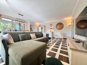 Et opholdsområde på Grand appartement mer et commerces à pied + 11 billeder