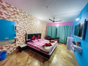 Letto o letti in una camera di New Sahil
