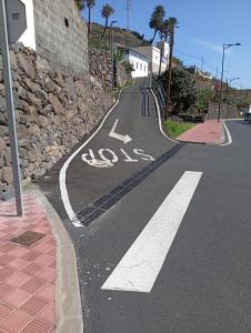 a road with a bike lane on the street at Casa Rural La Cuadra in Hermigua