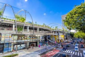 an overhead view of a city street with a bridge at Y's INN Tsutusji 014T in Tokyo