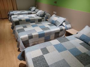 Postel nebo postele na pokoji v ubytování Hosteria de Gonzar