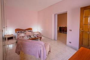 Postel nebo postele na pokoji v ubytování La Finestra sulle Gole del Farfa