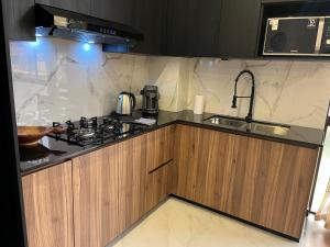 A cozinha ou cozinha compacta de Hermoso departamento en la mejor zona