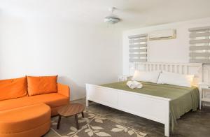 Postel nebo postele na pokoji v ubytování KITE BEACH HOTEL Oceanfront Apartments