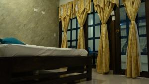 Una cama o camas en una habitación de Rest in Urabá - Descanso perfecto en Urabá