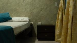 Una cama o camas en una habitación de Rest in Urabá - Descanso perfecto en Urabá 6 fotos más