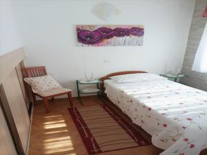 Ein Bett oder Betten in einem Zimmer der Unterkunft Apartments Daria