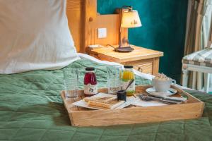 Nápoje v ubytování Hôtel Le Bois Joli