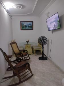 TV a/nebo společenská místnost v ubytování La fantástica Mi Hostal + 22 fotografií
