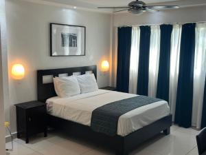 Postel nebo postele na pokoji v ubytování City Caribbean Hotel Boutique