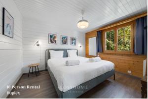 Postel nebo postele na pokoji v ubytování AmBach l Vue exceptionnelle l Sauna