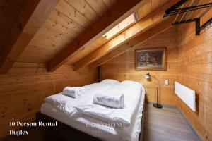 Postel nebo postele na pokoji v ubytování AmBach l Vue exceptionnelle l Sauna
