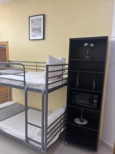Postel nebo postele na pokoji v ubytování City Caribbean Hotel Boutique