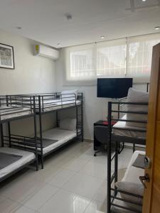 Postel nebo postele na pokoji v ubytování City Caribbean Hotel Boutique