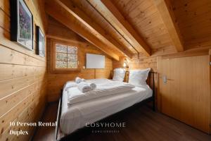 Postel nebo postele na pokoji v ubytování AmBach l Vue exceptionnelle l Sauna
