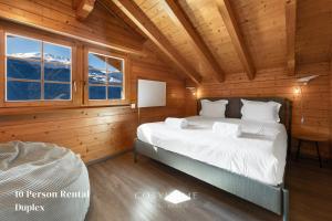 Postel nebo postele na pokoji v ubytování AmBach l Vue exceptionnelle l Sauna