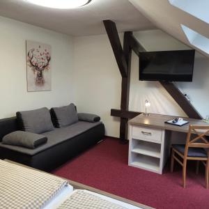 TV a/nebo společenská místnost v ubytování Hotel Meridian