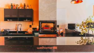 a kitchen with a sink and a stove top oven at Casa incrivel em Bebedouro com piscina e lazer in Bebedouro