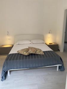 Ένα ή περισσότερα κρεβάτια σε δωμάτιο στο Ada