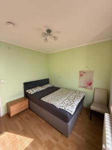 Ένα ή περισσότερα κρεβάτια σε δωμάτιο στο OTTO Apartment Bremen