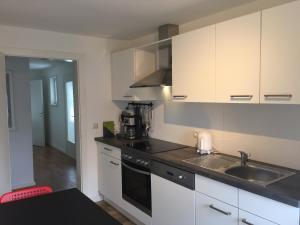 Kuchyň nebo kuchyňský kout v ubytování Appartement Winterberg Centrum 6 persoons + 21 fotografií