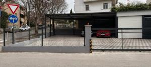 a garage with a car parked inside of it at IDRO Studio Apartments directly at the beach in Split