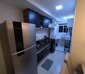 Kuchyňa alebo kuchynka v ubytovaní Apartamento Novo e Completo no Centro com garagem