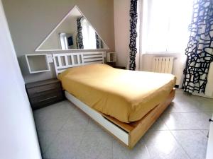 Postel nebo postele na pokoji v ubytování La Casa del Pesto - Guest House