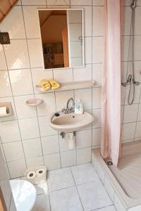 Ένα μπάνιο στο Encian Apartmanház Tihany