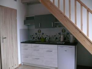 Kuchyň nebo kuchyňský kout v ubytování Gościniec Kaszubski Homestay